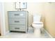 Bathroom featuring a new vanity with drawers and modern toilet at 1975 Glenmar Dr, Decatur, GA 30032
