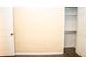 Empty bedroom closet with wooden floor and shelf at 1975 Glenmar Dr, Decatur, GA 30032