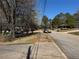 Neighborhood street view featuring a sidewalk and mature trees providing shade at 1975 Glenmar Dr, Decatur, GA 30032