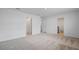 Bright bedroom with plush carpeting, ensuite bathroom, and walk-in closet at 3071 Birdsong Ave, Covington, GA 30016