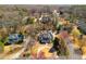 A bird's eye view of a traditionally styled home surrounded by established trees and manicured lawn at 3345 Highgate Hills Ne Dr, Duluth, GA 30097