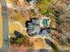 Aerial view of a home featuring a private backyard with a swimming pool and lush landscaping at 3345 Highgate Hills Ne Dr, Duluth, GA 30097