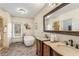 Luxurious bathroom with soaking tub, dual vanities, and natural light at 3345 Highgate Hills Ne Dr, Duluth, GA 30097