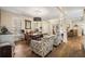 Dining area with hardwood floors and open to the living area at 3345 Highgate Hills Ne Dr, Duluth, GA 30097