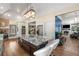 Open concept kitchen featuring a large island, stainless appliances, and views into the living room at 3345 Highgate Hills Ne Dr, Duluth, GA 30097