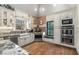 Bright kitchen with stainless steel appliances, a farmhouse sink, and white cabinets at 3345 Highgate Hills Ne Dr, Duluth, GA 30097