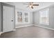 Bedroom with modern flooring, neutral walls, windows with lots of natural light and closet at 884 N Eugenia Nw Pl, Atlanta, GA 30318