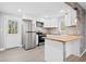 Charming kitchen featuring butcher block countertops, stainless steel appliances, and modern finishes at 884 N Eugenia Nw Pl, Atlanta, GA 30318
