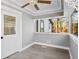 Cozy sunroom with modern flooring, neutral walls, tray ceiling and lots of natural light at 884 N Eugenia Nw Pl, Atlanta, GA 30318