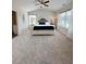 Large main bedroom features vaulted ceilings, natural lighting, and plush carpet at 1027 Northfield Dr, Conyers, GA 30013
