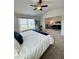 Bright main bedroom with vaulted ceilings that opens to a living area and has an exterior view at 1027 Northfield Dr, Conyers, GA 30013