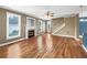 Inviting living room with hardwood floors and a cozy fireplace, perfect for relaxation at 185 Stayman Park, Fayetteville, GA 30215