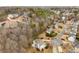 A beautiful home surrounded by lush trees and landscaping, nestled in a peaceful neighborhood setting at 2358 Alexander Farms Sw Ct, Marietta, GA 30064