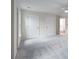 Spacious bedroom with neutral carpet, white walls and ceiling fan at 2358 Alexander Farms Sw Ct, Marietta, GA 30064