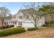Attractive two-story home with a two-car garage and well-maintained landscaping at 2358 Alexander Farms Sw Ct, Marietta, GA 30064