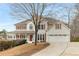 Beautiful two-story home with a covered porch and attached garage at 2358 Alexander Farms Sw Ct, Marietta, GA 30064