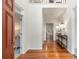 Inviting foyer with hardwood floors, neutral walls, and stylish console table at 2358 Alexander Farms Sw Ct, Marietta, GA 30064