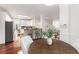 View of the kitchen with island, breakfast bar, stainless appliances and hardwood floors at 2358 Alexander Farms Sw Ct, Marietta, GA 30064
