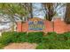 Elegant brick sign at the community entrance surrounded by lush greenery, setting an inviting tone at 2358 Alexander Farms Sw Ct, Marietta, GA 30064
