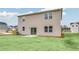 Exterior of home with sliding glass doors leading to backyard at 3639 Olive Grove Ln, Covington, GA 30016