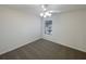 Cozy bedroom with neutral colored walls, carpet, one window, and a ceiling fan at 4028 Elm Trace Dr, Loganville, GA 30052