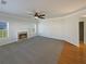 Bright living room featuring a fireplace and ample natural light at 4028 Elm Trace Dr, Loganville, GA 30052