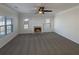 Bright living room featuring a fireplace and ample natural light at 4028 Elm Trace Dr, Loganville, GA 30052