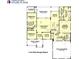 Detailed floor plan featuring three bedrooms, living room, kitchen and a two car garage at 546 Palm St, Holly Springs, GA 30115