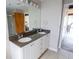 Modern bathroom featuring a dual sink granite countertop, and tile floors at 1133 Church Se St # 2, Covington, GA 30014