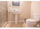 Bright bathroom features modern sink, toilet, and a glass-enclosed shower with tile surround at 1133 Church Se St # 2, Covington, GA 30014
