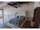 Charming bedroom featuring exposed ductwork, stylish furnishings, and a comfortable layout at 1133 Church Se St # 2, Covington, GA 30014