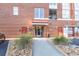 Exterior of brick building with covered entryway and well-maintained landscaping at 1133 Church Se St # 2, Covington, GA 30014