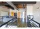Loft featuring a bedroom, kitchen, dining area, exposed ductwork, and hardwood floors at 1133 Church Se St # 2, Covington, GA 30014