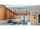 Charming kitchen features stainless steel appliances, gas range, wood cabinets and granite countertops at 1133 Church Se St # 2, Covington, GA 30014