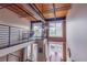Multi-level living room features a ceiling fan, large windows and open floor plan at 1133 Church Se St # 2, Covington, GA 30014