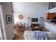 Open-concept living space with dining area, modern kitchen, and comfortable seating at 1133 Church Se St # 2, Covington, GA 30014