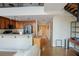Living room features open kitchen, stairs and front door, with natural light at 1133 Church Se St # 2, Covington, GA 30014
