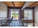 Office space featuring a large window, exposed brick, and lots of natural light at 1133 Church Se St # 2, Covington, GA 30014