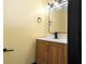 Modern bathroom featuring a stylish vanity with sleek hardware and a well-lit mirror at 1802 S Gordon Sw St, Atlanta, GA 30310