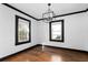 Bright dining room features hardwood floors, black trim, and a modern light fixture at 1802 S Gordon Sw St, Atlanta, GA 30310