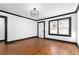 Bright living room with hardwood floors and large windows offering plenty of natural light at 1802 S Gordon Sw St, Atlanta, GA 30310