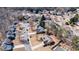 Neighborhood aerial showcasing a well-maintained single-story home with mature trees and landscaping at 7350 Brassfield Dr, Cumming, GA 30041