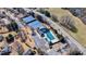 Overhead angle features community pool and tennis courts with convenient parking at 7350 Brassfield Dr, Cumming, GA 30041