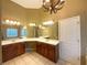 Bathroom features a double sink vanity, tile flooring, and ample lighting at 175 Stillwood Dr, Fayetteville, GA 30215