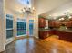 Eat-in kitchen with stainless appliances, granite countertops, and natural light at 175 Stillwood Dr, Fayetteville, GA 30215