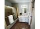 Bathroom featuring a vanity with storage space, a framed mirror and a shower tub combination at 295 Weatherstone Ln, Marietta, GA 30068