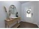 Welcoming foyer with dark wood floors and decorative accents at 5620 Berney Cir, Powder Springs, GA 30127