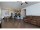 Open concept living area showcasing hardwood floors and lots of natural light at 5620 Berney Cir, Powder Springs, GA 30127