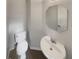 Stylish powder room featuring modern fixtures and design; a convenient and elegant space for guests at 7782 Wethersfield Dr, Jonesboro, GA 30236