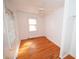 Cozy bedroom featuring hardwood floors, a ceiling fan, and natural light from a window at 1191 Beechview Se Dr, Atlanta, GA 30316
